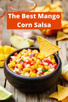 the best mango corn salsa in a bowl with tortilla chips