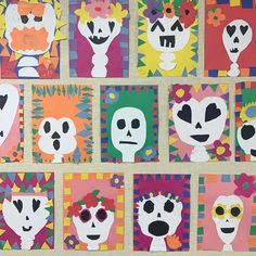 a group of paper cut outs with skulls and flowers on them, all decorated in different colors