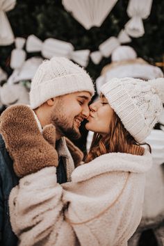 a man and woman standing next to each other