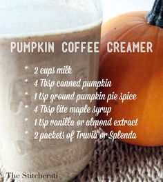 pumpkin coffee creamer recipe in a mason jar next to an orange and black pumpkin