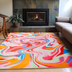 a living room with a fire place and colorful rug