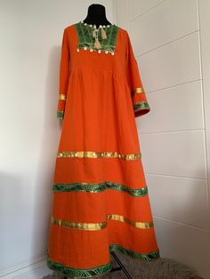 This is stunning vintage-style Afghan Dress is made from 100% cotton. The dress is suitable for all occasions. One size fits many as ,but it is most suited to medium body size. Dimensions: Shoulder: 39.5cm Length: 137cm Sleeve:51cm Waist size:98cm Traditional Fitted Cotton Maxi Dress, Cotton Dresses For Traditional Ceremonies, Cotton Handloom Dresses For Festivals, Festive Cotton Dress With Woven Motifs, Fitted Bohemian Handloom Dresses, Cotton Maxi Dress For Traditional Ceremonies, Traditional Cotton Maxi Dress, Bohemian Handloom Dress For Festivals, Bohemian Handloom Dresses For Festive Occasions