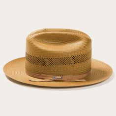 Crafted by hand in the U.S.A., the Open Road Straw Hat combines high-quality 100% Shantung straw with a firm finish for the ultimate in warm-weather comfort and style. With its western-style crown and 2 ¾” bound-edge brim, the Open Road Straw easily transitions from country to city to beach—and looks equally sharp on a woman or a man. Introduced in 1937, the Open Road was originally sold with an open crown, which could then be creased to the customer’s liking. Since 1948, it has been finished wi Tuxedo Accessories, Straw Cowboy Hat, Western Accessories, Wide Trousers, Thigh Boot, Heads Up, Open Road, Hat Band, City Style