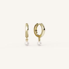 Pearl Drop Hoops feature a classic gold hoop with a dangling 3.5mm cultured seed pearl with a hinged post closure. Seed Pearl, Classic Gold, Gold Hoop, Pearl Drop, Types Of Metal, Yellow Gold, Yellow, Gold