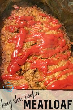 the meatloaf is covered with red sauce and has been cooked in an oven