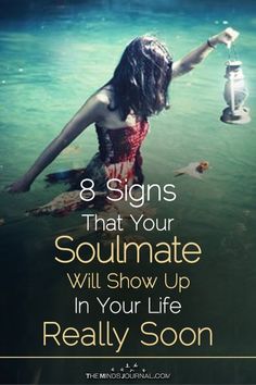 a woman sitting in the water holding a lantern with text overlay that reads 8 signs that your soulmate will show up in your life really soon