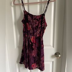 Never Worn New With Tag Mini Dress Velvet With Floral Design And Tie Back Purple Lined Sundress, Casual Burgundy Sleeveless Dress, Casual Burgundy Summer Dress, Purple Floral Print Dress With Spaghetti Straps, Burgundy Floral Print Summer Dress, Casual Burgundy Dress For Date Night, Red Sleeveless Rayon Dress, Flowy Burgundy Dresses For Summer, Casual Purple Dress For Date Night