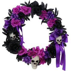 a wreath with skulls and purple flowers on the front is decorated in black, purple and white