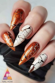 Fall in love with these earthy brown nails with white tribal designs. Perfect for October nails fall colors, this design brings a unique and artistic flair to your manicure. Visit nailhow.com for more creative nail inspirations and save this pin for your next salon visit! Earth Tones Nails Designs, October Nails Fall Colors, October Nails Fall, October Nail Designs, Nails Fall Colors, Nails With White, Tree Nail Art, Snowman Nails