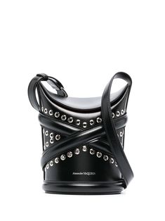 Lei studded bucket bag from Alexander McQueen featuring black, calf leather, silver-tone stud detailing, adjustable shoulder strap, foldover top with magnetic fastening and main compartment. This item is in size UNI and the color is Black Alexander Mcqueen Handbags, Black Alexander Mcqueen, Alexander Mcqueen Bag, Leather Jewels, Leather Bucket Bag, Leather Bucket, Leather Silver, Black Cross Body Bag, Roberto Cavalli