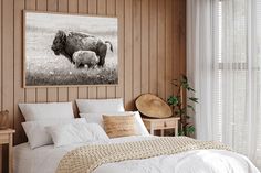 a bison and her calf in a bedroom with wood paneled walls