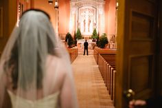 the bride and groom are walking down the aisle to their wedding ceremony at st luke's church