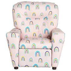 a child's recliner with rainbows and dots on the back, in pink