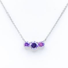 This Vintage Sterling Silver Amethyst Necklace features three round faceted Amethyst stones on a 16-Inch Sterling Silver chain. The stones are graduating in size. Amethyst is the gemstone of peace. It calms the mind, it balances emotions, enhances intuition and inspires spirituality. Amethyst is also the February Birthstone. Necklace is pre-owned and in great condition. All my jewelry items come in a black velvet jewelry pouch or gift box. Feel free to message me with any questions. Fast shipping and handling. THANK YOU for shopping with Legacy Collectors. Amethyst Three Stone Jewelry Gift, Three-stone Amethyst Jewelry Gift, Three Stone Amethyst Jewelry Gift, Three Stone Round Amethyst Jewelry, Elegant Purple Three-stone Jewelry, Elegant Three Stone Purple Jewelry, Elegant Purple Three Stone Jewelry, February Birthstone Necklace, Amethyst Stones