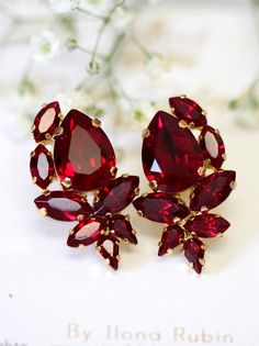 Ruby Earrings, Ruby Red Bridal Bridesmaids Swarovski Cluster Earrings by iloniti  #ruby, #earrings, #jewelry, #bridal, #Jewelry, #swarovski Luxury Ruby Earrings With Gemstone Accents, Elegant Red Cluster Earrings For Wedding, Red Clip-on Earrings For Party, Red Cluster Earrings For Formal Events, Red Clip-on Earrings For Wedding, Elegant Red Cluster Earrings For Anniversary, Ruby Bridal Earrings For Party, Red Clip-on Jewelry For Wedding, Formal Red Cluster Earrings For Pierced Ears