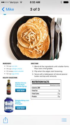 a plate with pancakes on it next to a fork and bottle of nutrition