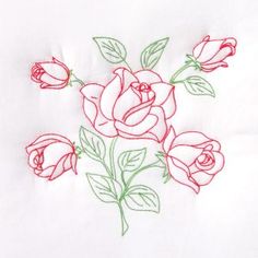 a bunch of red roses sitting on top of a white sheet