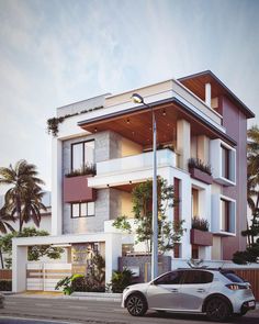 a white car parked in front of a tall building with plants on the balconies