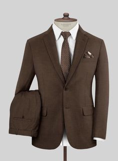 Simple but effective, the Worsted Brown Wool Suit offers an on-trend take on classic dressing. Crafted from a wool blend, the fabric comes with a brown hue that will help you focus on the special moments and be a great addition to your wardrobe.   Look Includes  Worsted Brown Wool Fabric  Two Button Jacket Style  Notch Lapel  Horn Brown Buttons  Single Vent  Three Cuff Buttons  Two Welted Pocket on Trousers   You can change the look during customization if required.  Lining: Viscose; Dry Clean. Elegant Semi-formal Brown Outerwear, Elegant Brown Semi-formal Outerwear, Tailored Brown Suit With Long Sleeves, Elegant Brown Suits With Concealed Placket, Elegant Brown Blazer With Welt Pockets, Elegant Brown Outerwear For Business Casual, Brown Wool Suits With Suit Collar, Tailored Brown Blazer, Brown Flat Front Suit For Fall