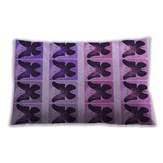 a purple and black pillow with butterflies on it