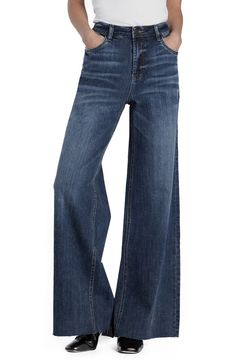 Raw hems refresh the retro style of elongating wide-leg jeans crafted from faded low-stretch denim. 32" inseam; 23" leg opening; 10 1/4" front rise Zip fly with button closure Five-pocket style 67% cotton, 27% REPREVE® recycled polyester, 5% rayon, 1% spandex REPREVE recycled polyester is made from 100% post-consumer recycled plastic bottles Machine wash, tumble dry Imported High Waist Wide Leg Jeans, Wide Jeans, Country Outfits, High Waisted Denim, Primavera Estate, Denim Fashion, Wide Leg Jeans, Autumn Winter Fashion, Bottoms Pants