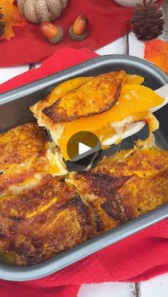 a pan filled with food on top of a table