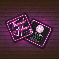 two neon business cards with the words thank you and an image of a heart on them