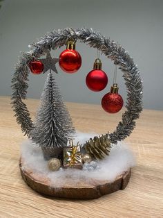 an ornament with christmas decorations on top of it