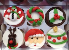 cupcakes decorated like santa claus and other holiday treats