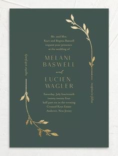 an elegant wedding card with gold leaves on the front and back, in dark green