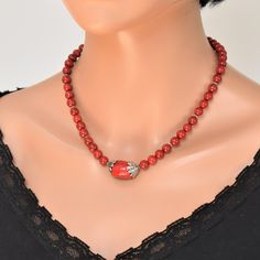 ♥ Ready to ship ♥ 100% handmade ♥ Material: natural coral beads 8 mm ♥ Packed in a gift box ♥ Custom length  Make a statement with this stunning red coral necklace featuring a gorgeous centerpiece.  Delicately handcrafted, this necklace showcases the natural beauty of red coral with its vibrant hue and intricate patterns.  The centerpiece adds a touch of elegance, making it a perfect accessory for both casual and formal occasions.  Whether you're dressing up for a night out or simply want to ele Gift Red Coral Necklaces With 8mm Beads, Elegant Coral Beaded Necklaces For Gift, Elegant Coral Beaded Necklace For Gift, Gift Red Coral Round Beads, Gift-grade Red Coral Beads, Gift Red Coral Beaded Necklace With Gemstone Beads, Red Coral Gemstone Beaded Necklace Gift, Gemstone Beads Choker As Gift, Gemstone Beads Choker For Gift