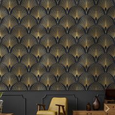 an art deco style wallpaper with gold fan design on the back and black background