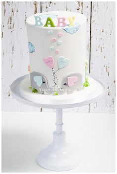 a baby shower cake on a white plate