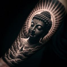 a person with a buddha tattoo on their arm