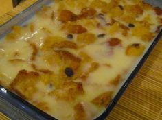 a casserole dish with cheese and toppings in a pan on a table