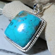 "Natural High Grade Kingman Arizona Turquoise Handmade Pendant set in .925 Sterling Silver, 1 1/2\" x 1\" with bail weighing 11 grams GH06. This is a handpicked natural rectangle shaped stone, the exact one shown in picture.  The sterling silver is .925 and stamped.  Each piece is hand made by artisans in my shop. The quality of the stones and the silver workmanship is impressive.  Please look at other items in my store.  I sell ready-made jewelry with hand crafted silver work, pendants with a sterling silver bails and beautiful unique stones for jewelry wire wrapping and weaving. You will pay exact amount on shipping plus $1 for supplies and labor. All items are shipped within a couple of days after payment and are shipped USPS first class or international first class. Items are available Blue Turquoise Necklace Stamped 925 As A Gift, Artisan Turquoise Rectangular Jewelry, Gift Blue Turquoise Necklace Stamped 925, Collectible Turquoise Sterling Silver Necklace, Rectangular Turquoise Jewelry For Collectors, Collectible Rectangular Turquoise Jewelry, Turquoise Sterling Silver Rectangular Pendant Necklace, Sterling Silver Turquoise Necklace Stamped 925, Turquoise Sterling Silver Necklace With Rectangular Pendant