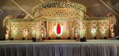 an elaborate stage set up for a wedding