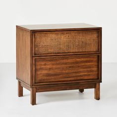 a brown wooden cabinet with two drawers