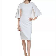 Brand New Calvin Klein White Dress With Cape Attached. Size 8. Capelet Overlay At Bodice. Stretchy And Supportive. Round Neckline. Zip Back. White Stretch Dress For Work, Elegant White Calvin Klein Midi Dress, Fitted White Calvin Klein Midi Dress, Calvin Klein White Sheath Midi Dress, Fitted Calvin Klein Dress For Brunch, Calvin Klein White Midi Dress For Formal Occasions, Elegant White Calvin Klein Dress, Calvin Klein White Fitted Midi Dress, Calvin Klein White Sheath Dress