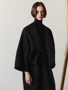 Composition : Wool 90% Nylon 10%Country of Origin : KOREA Chic Fitted Cape Outerwear, Chic Evening Cape Outerwear, Structured Wool Evening Outerwear, Structured Wool Outerwear For Evening, Black Cape-style Outerwear For Work, Fitted Cape Outerwear For Work, Fitted Cape For Workwear, Chic Cape Outerwear For Office, Classic Black Structured Outerwear