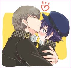 two people are kissing each other while one is wearing a hat and the other has a coat