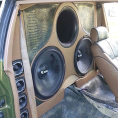 the inside of a car with speakers in it