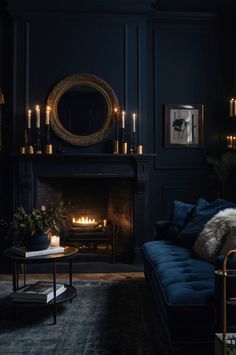 a living room filled with furniture and a fire place next to a mantle covered in candles