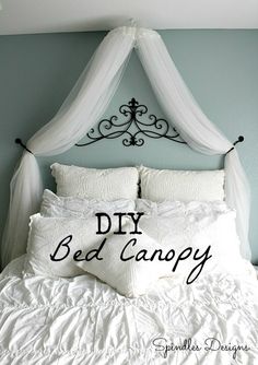 the bed is made with white sheets and pillows