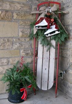 an old sled is decorated with christmas decorations