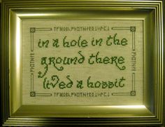 a cross - stitch quote in a frame with the words i'm hole in the ground there