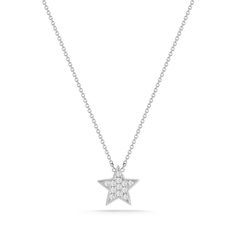 We're seeing stars! Our Julianne Himiko gold and diamond star necklace is what celestial dreams are made of. This single star pendant is adorned with pavé-set diamonds and hangs on a delicate diamond cut cable chain. Delicate and dainty, this charming necklace is perfect for layering. This is the must-have piece for all the Astrology lovers out there. It is available in 14k white, yellow, and rose gold with a spring-ring clasp and a sparkling mini-chain. The pendant is always white gold to show Star-shaped Diamond White Necklace With Single Cut Diamonds, Diamond Star Charm Pendant Necklace, White Gold Star Necklace Fine Jewelry, Diamond Star Charm Necklace, Fine Jewelry White Gold Necklace With Star Charm, Dainty Star Diamond Necklace, Dainty Diamond Star Necklace, Diamond Star Necklace, Necklace White Gold