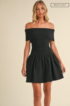 Be the envy of every party with the Gracie Mini Dress! Featuring a flirty off-the-shoulder neckline and a playful drop waist, this black dress will accentuate your curves and make you stand out from the crowd. Perfect for a wedding guest look. *THE ITEM IS ESTIMATED TO ARRIVE ON THE DATE ABOVE* Details+ Fit 95% Polyester | 5% Spandex Runs True to Size Hand Wash Cold Hang Dry Straight Neckline Off The Shoulder Drop Waist Flared Skirt Black | Solid Model is 5'8" and wearing a size Small Wedding Guest Looks, Jumpsuit Online, Mini Dress Black, Straight Neckline, Long Crop Top, Crop Top Blouse, Flared Skirt, Black Solid, Drop Waist