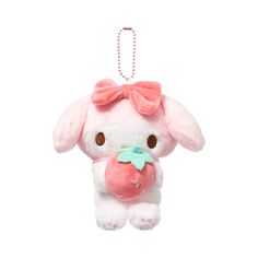 a pink stuffed animal with a bow on it's head hanging from a string