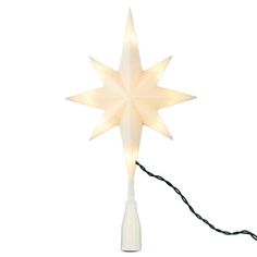 a white star shaped light on a string